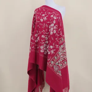 Thick warm embroidered cashmere feel women shawl cape with elegant floral paisley design.