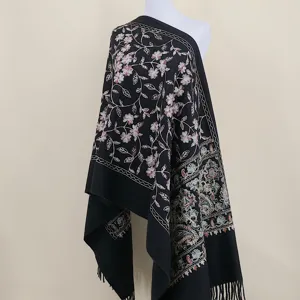 Thickened black imitation cashmere scarf with ethnic paisley embroidery and elegant fringe edges.
