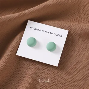 Matte green round hijab magnetic pins set, secure clothing clips for scarves and shawls.