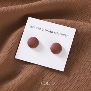 Round matte magnetic hijab pins scarf clips in a set of two, detailed close-up shot.