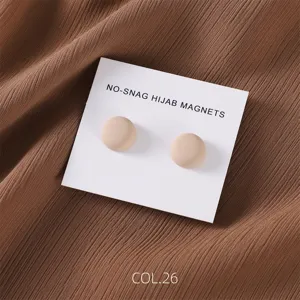 Matte circular strong magnetic hijab pins, minimalist hijab magnets, two-piece set detail view.