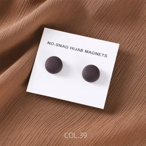 Matte round hijab magnets in dark brown, secure magnetic pin for scarves and wraps.