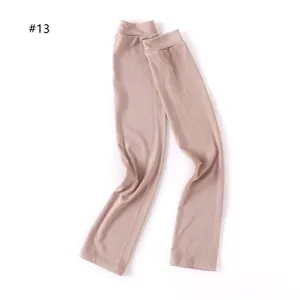 Detail view of smooth modal sun protection arm sleeves in light nude, soft and elastic fabric.