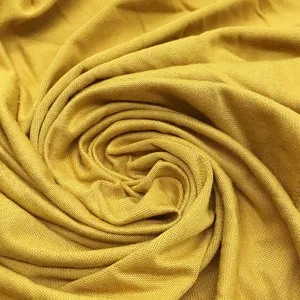 High quality modal stretch inner cap fabric detail showcasing soft mustard yellow material texture.