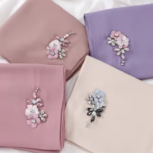Exquisite handmade rhinestone flower chiffon hijab detail, elegant solid color scarf with crystals.