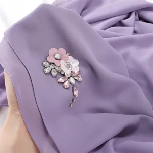 Elegant purple chiffon scarf featuring handmade rhinestone flower and pearl details for women.