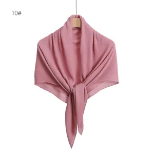 Detailed view of the pink pleated chiffon square scarf with glitter silver sprinkles, elegant texture.