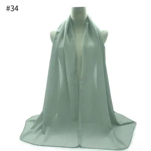 Light green pearl chiffon hijab scarf shawl, elegant solid color sun protection wrap.