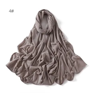 Detail view of the soft elastic jersey hijab, showing breathable fabric texture and color.