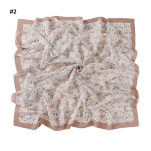 Floral print square silk scarf with wavy laser cut edges, ideal for daily stylish wear.