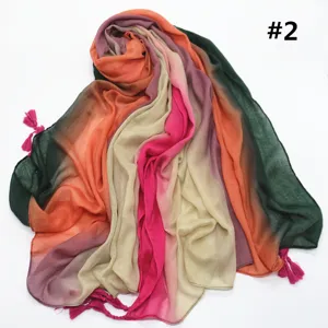 Soft gradient rainbow cotton linen scarf with elegant pink tassels, colorful and stylish.