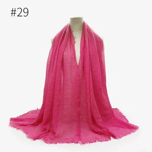 Sciarpa scialle in misto cotone stropicciato tinta unita da donna con bordo frangiato