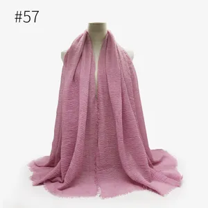 Donna sciarpa e scialle in cotone stropicciato tinta unita, dettaglio hijab con frange.