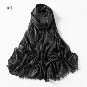 Elegant black metallic sparkly viscose scarf with fringe, perfect for evening wear and parties.