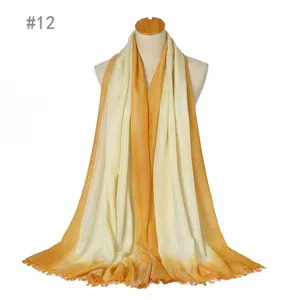 Gradient metallic fiber women scarf shawl with short tassels, elegant yellow and beige design.
