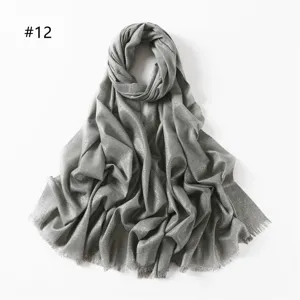 Grey metallic viscose scarf with short fringe, elegant solid color shawl detail view.