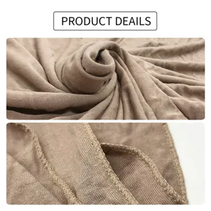 Detailed view of the soft modal cotton jersey fabric, highlighting fine stitching and texture.