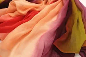 Detailed view of the soft gradient rainbow cotton scarf showing rich colors and fine texture.