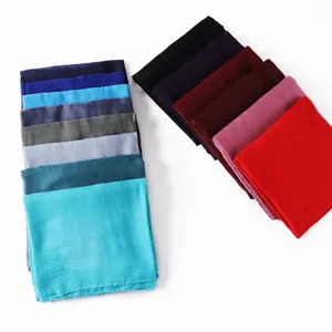 Detail view of solid color glitter viscose cotton linen hijab scarf, soft shawl, multi-color.