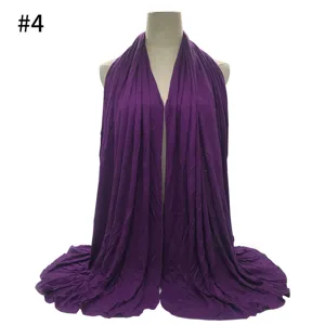 Solid color modal jersey hijab scarf detail view, soft draped fabric, perfect for daily wear.