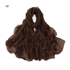 Detailed view of the dark brown starry rhinestone sheer voile scarf, showing texture.