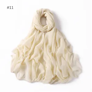 Glitter viscose scarf detail view, shimmering beige hijab and lightweight shawl for women.
