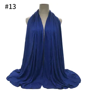 Detail view of the royal blue modal jersey hijab scarf, soft stretch fabric texture closeup