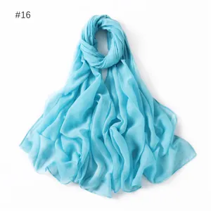 Light blue glitter scarf for women, lightweight shimmer viscose shawl and hijab wrap.