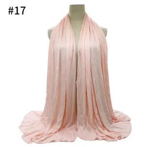 Soft solid color cotton jersey hijab scarf detail view, comfortable breathable fabric material.