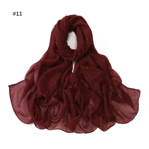 Burgundy glitter scarf detail, lightweight sheer voile fabric, shimmering rhinestone accent.