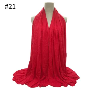 Detailed view of the soft red modal cotton jersey hijab and long scarf for women.