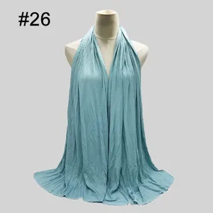Soft modal jersey hijab scarf detail view, breathable lightweight fabric in light blue color.