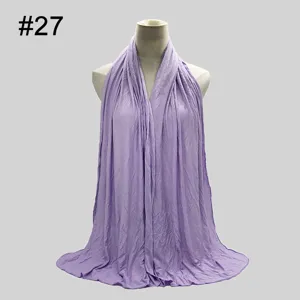 Detailed view of the soft solid color modal jersey hijab scarf in light purple fabric.