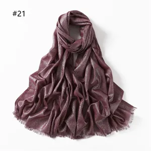 Shimmering metallic viscose women scarf with short tassels elegant burgundy shawl detail.