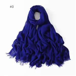 Detailed close-up view of the solid blue modal cotton breathable fringe shawl scarf.