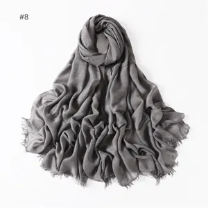 Details of the solid gray breathable modal cotton scarf with short tassels for daily wear.