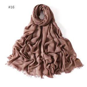 Detailed view of the lightweight solid color modal cotton scarf with neat fringe edges.