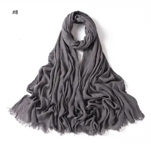 Grey solid color crinkled rayon scarf with tassels, soft and breathable women headwear accessory.