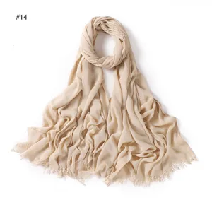 Khaki solid color crinkled rayon scarf with tassel ends, soft and breathable fabric.