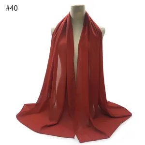 Rust red chiffon scarf shawl for women, lightweight sun protection hijab and head wrap.