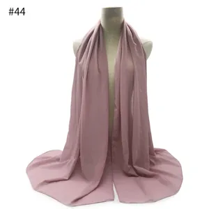 Mauve chiffon hijab detail showcasing lightweight fabric drape and elegant color tone.