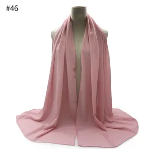 Solid pink chiffon hijab shawl for women, lightweight breathable long scarf for daily wear.