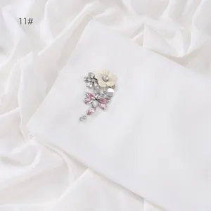 Exquisite white chiffon scarf with handmade rhinestone dragonfly brooch detail design.
