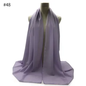 Detailed view of the light purple chiffon hijab scarf showing soft drape and fine fabric texture.