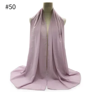 Detail shot of light purple pearl chiffon hijab scarf shawl, elegant lightweight summer wrap.
