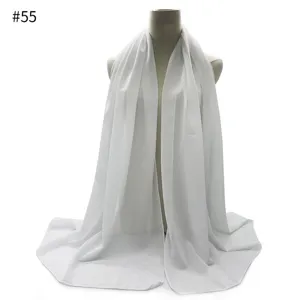 Detail view of solid white chiffon hijab scarf draped on mannequin torso, soft and lightweight.