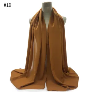 Solid color pearl chiffon hijab scarf for women, lightweight caramel long headwrap shawl.