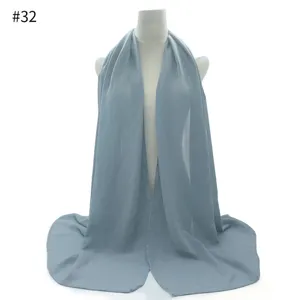 Solid color pearl chiffon women scarf hijab shawl in light blue, elegant sun protection wrap.
