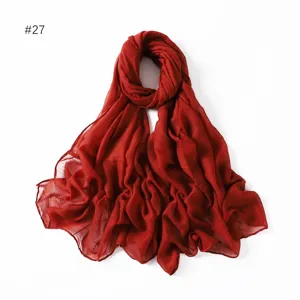 Close-up detail of the lightweight red glitter viscose cotton linen scarf shawl showcase.