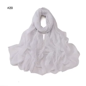 Detailed close-up view of the light grey sheer rhinestone scarf, soft and breathable fabric.